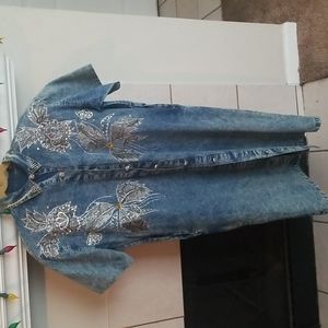 Beautiful rhinestone jean dress is a size 14.